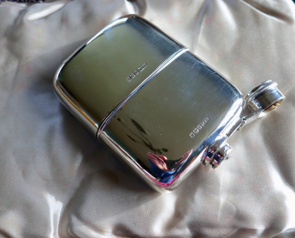 A Solid Silver Hall Marked Hip Flask and Cup by Daniel & Arter View VII
