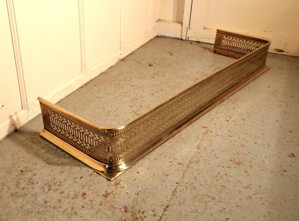 Long Victorian Pierced Brass Fender 