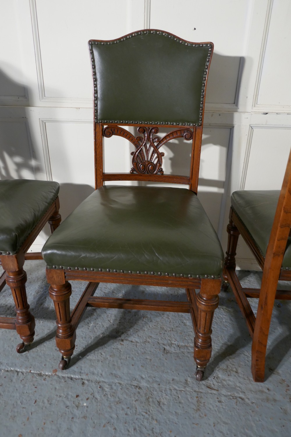 Set of 11 Arts and Crafts Golden Oak and Leather Dining Chairs   View VI