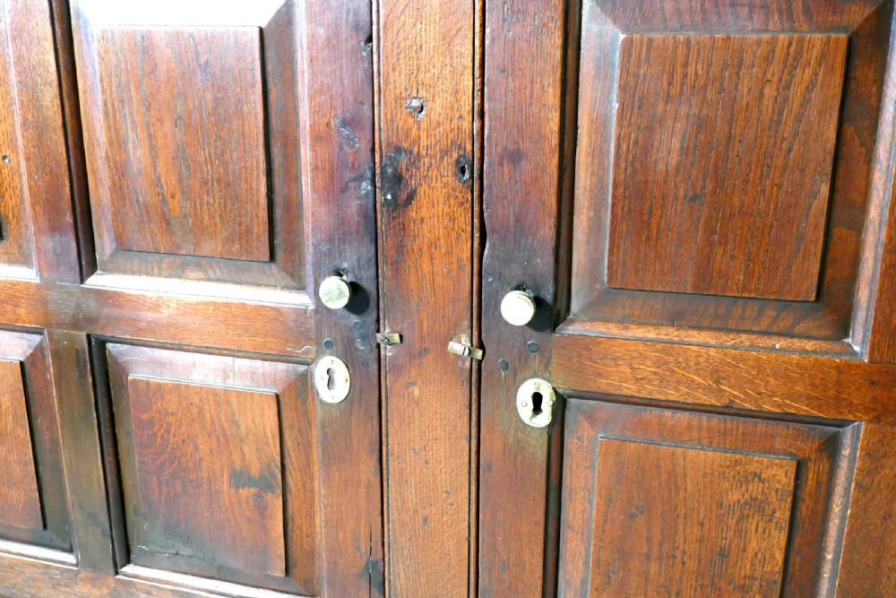 A 17th Century Rustic Oak Dresser Base Cupboard View III