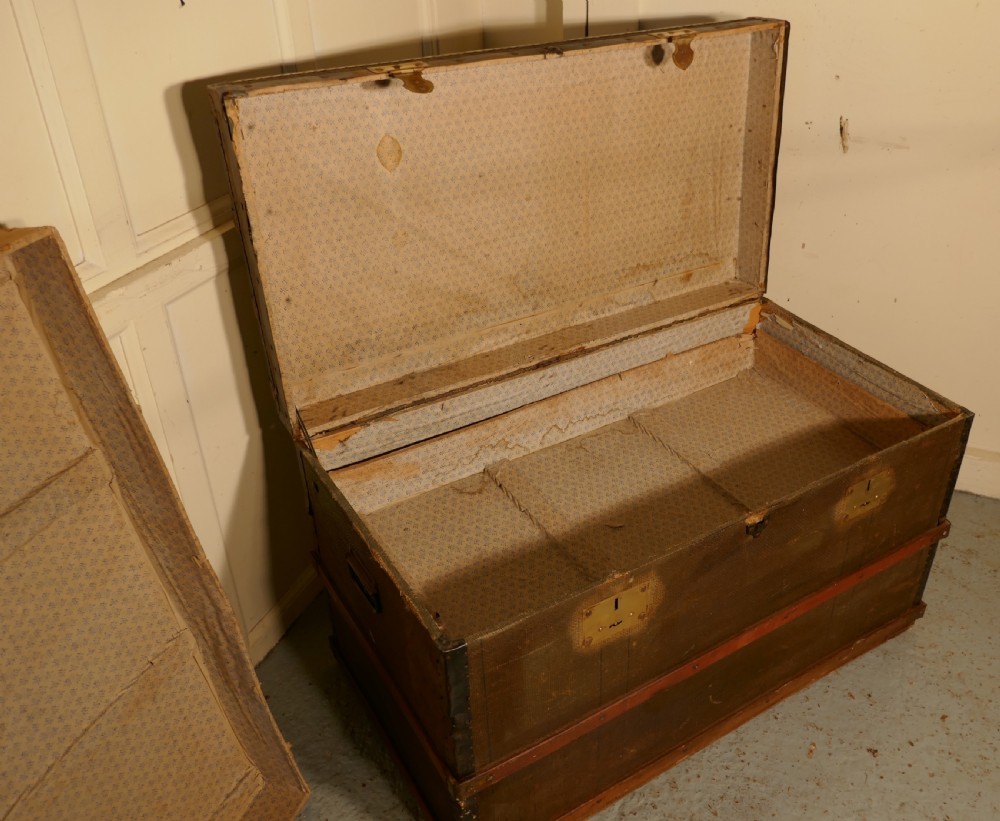 A Vintage Brass and Bound Canvas Travel Steamer Trunk View VIII
