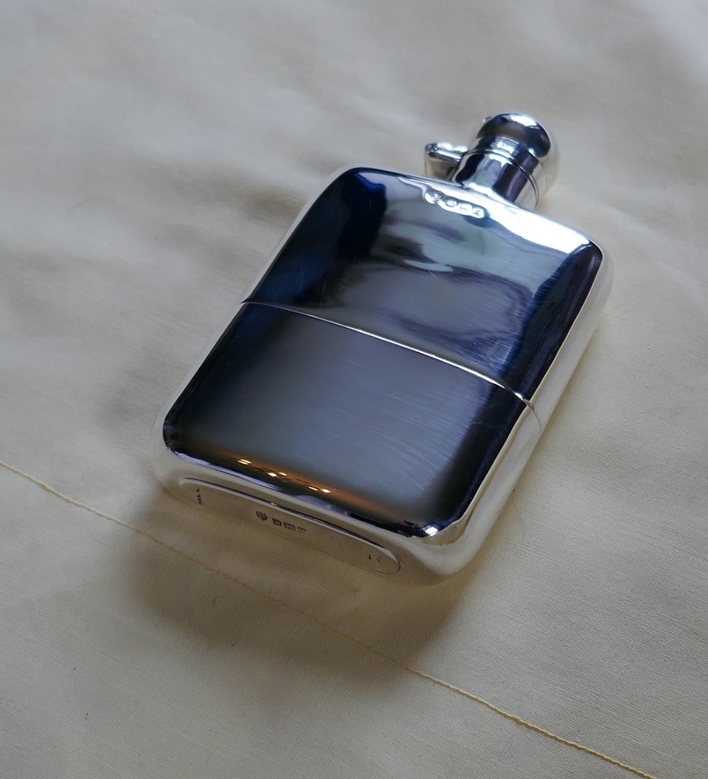 A Solid Silver Hall Marked Hip Flask and Cup by Stewart Dawson & Co, 1912