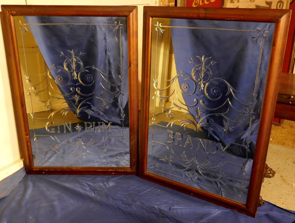 A Pair of Large Etched Glass Pub Mirrors