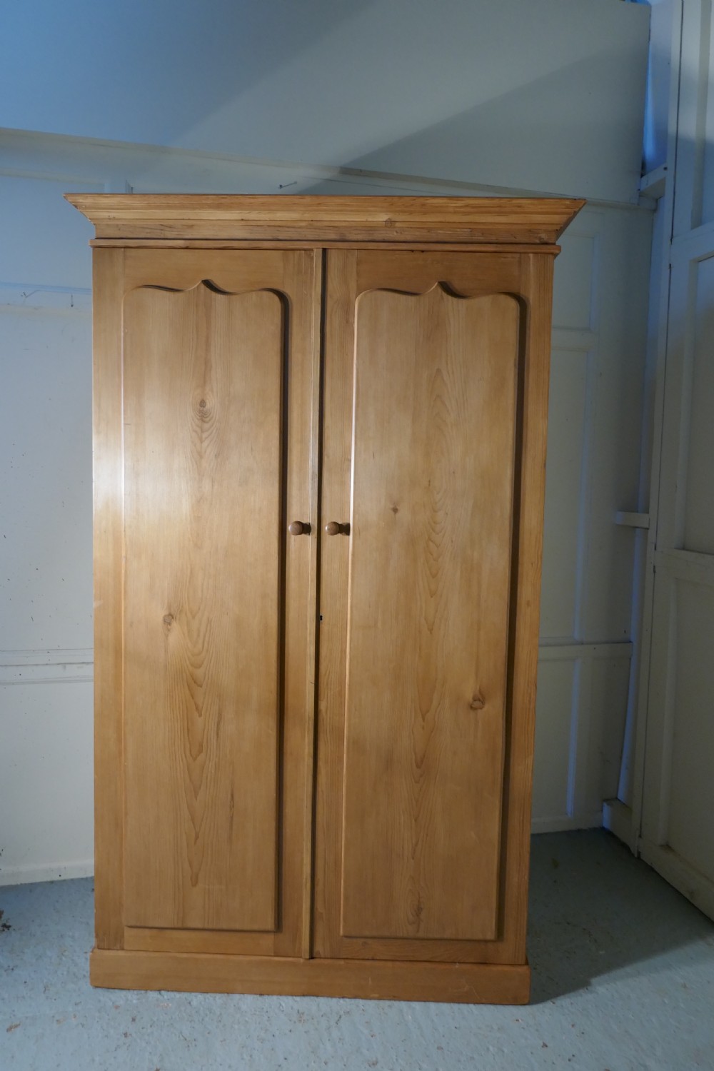 An Early Victorian Stripped Pine Wardrobe View III