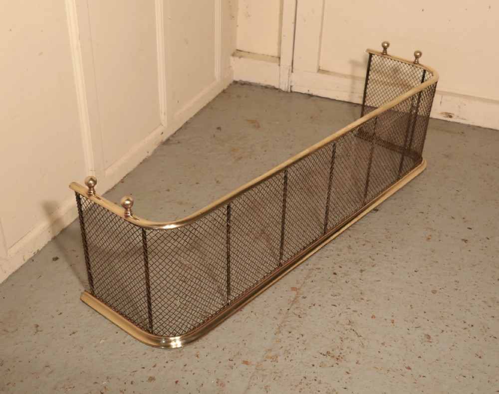 A Victorian Brass and Iron Fender or Fireguard