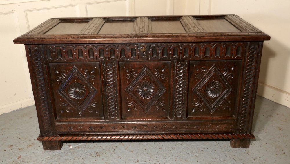 A Large 17th Century  Carved Oak Coffer 