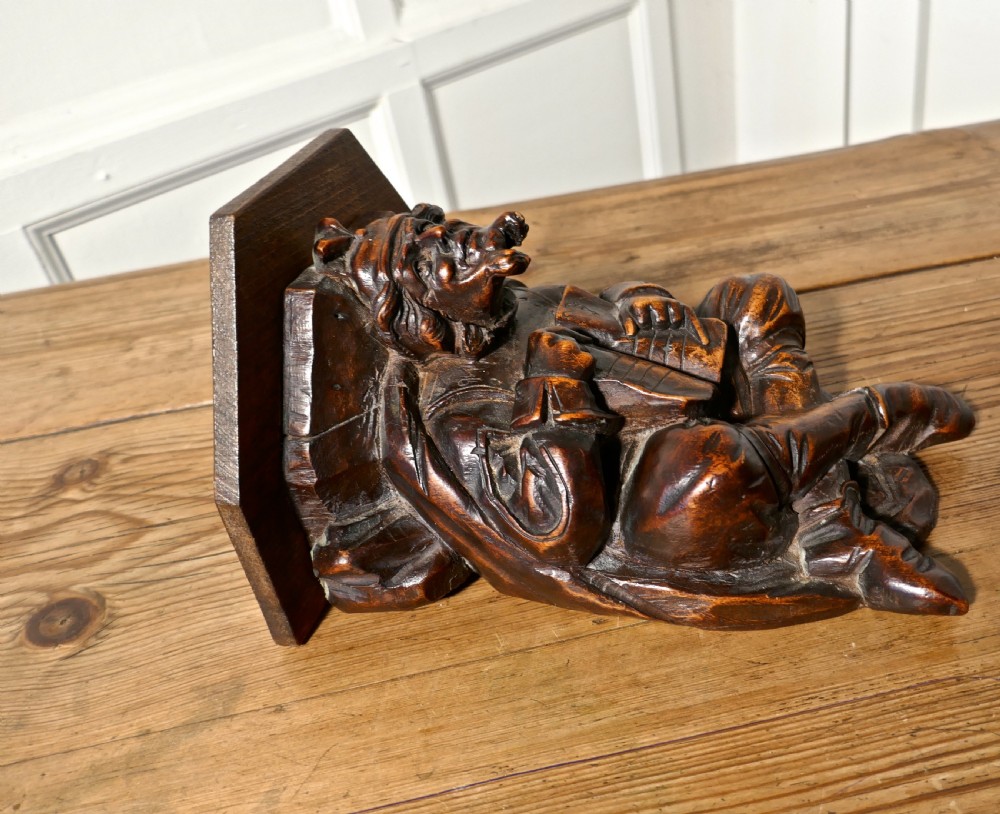 A 19th Century Carved Oak Wall Bracket, Medieval Magician  View V