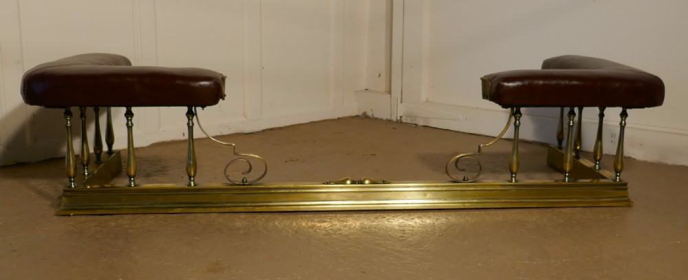 A Large Arts and Crafts Brass and Leather Club Fender View IV