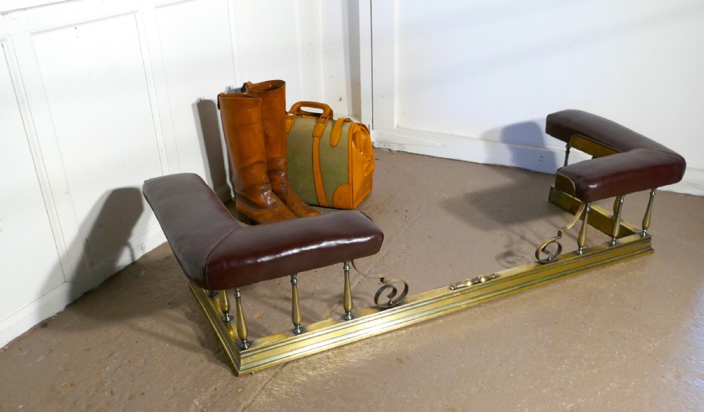A Large Arts and Crafts Brass and Leather Club Fender View VI