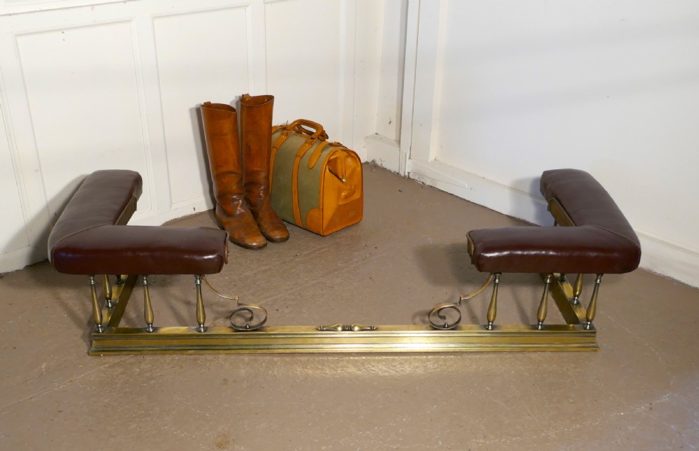A Large Arts and Crafts Brass and Leather Club Fender View VII