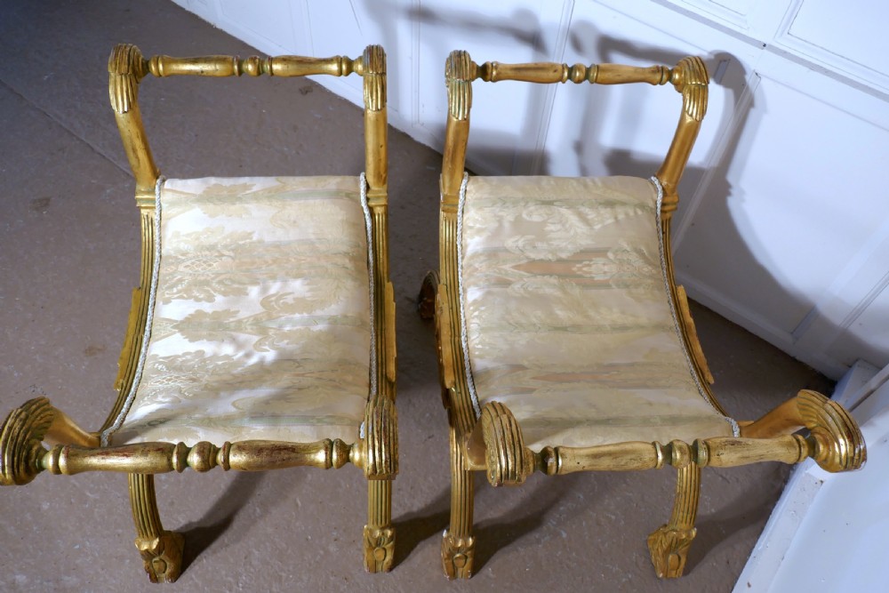 Pair of 19th Century Empire Style Gilt X Frame Stools View II