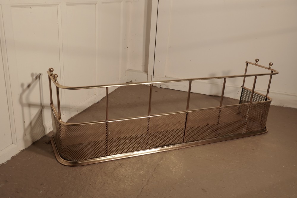 A Large Victorian Brass Club Fender  View II