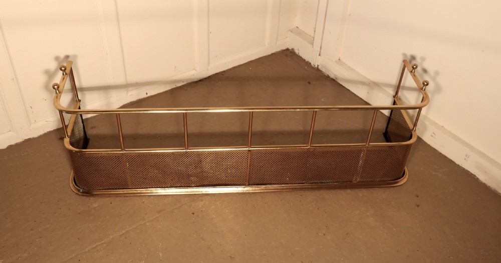 A Large Victorian Brass Club Fender  View V
