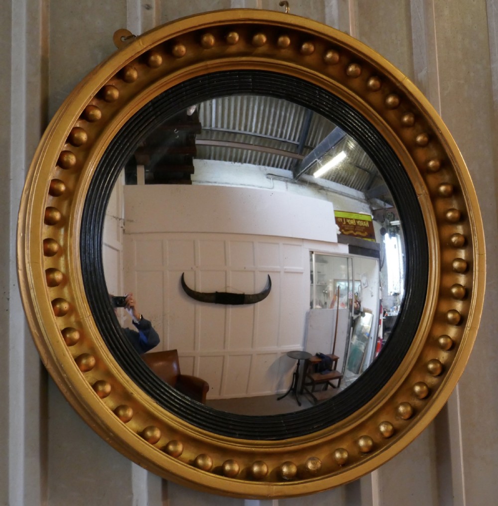 A Large Regency Convex Gilt Wall Mirror 