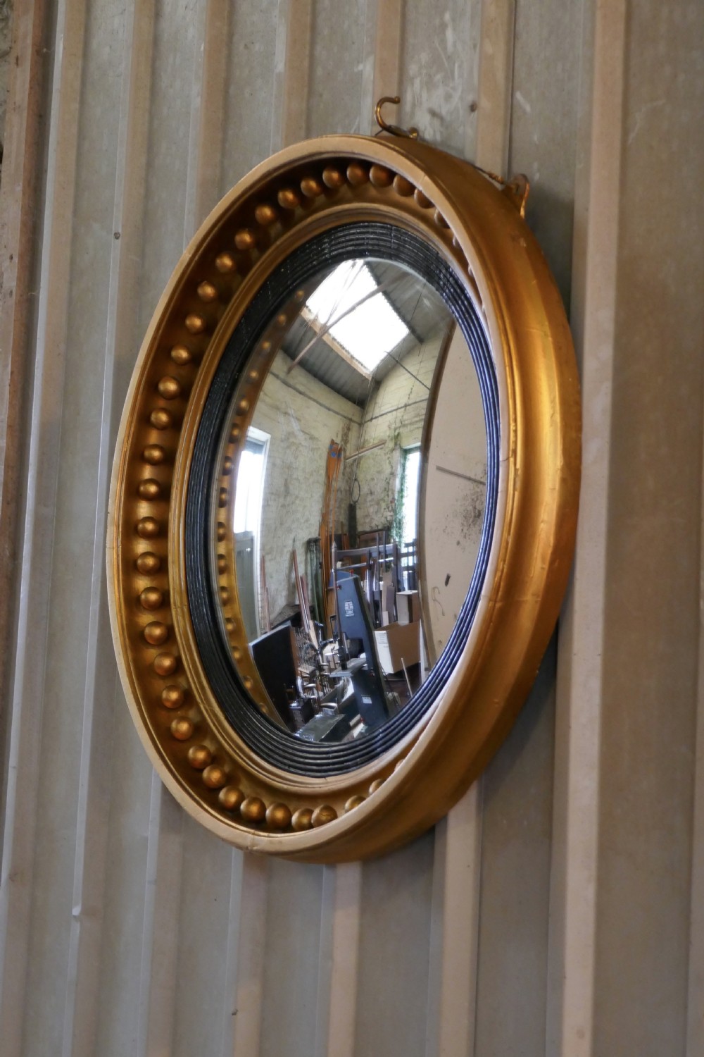 A Large Regency Convex Gilt Wall Mirror  View VII