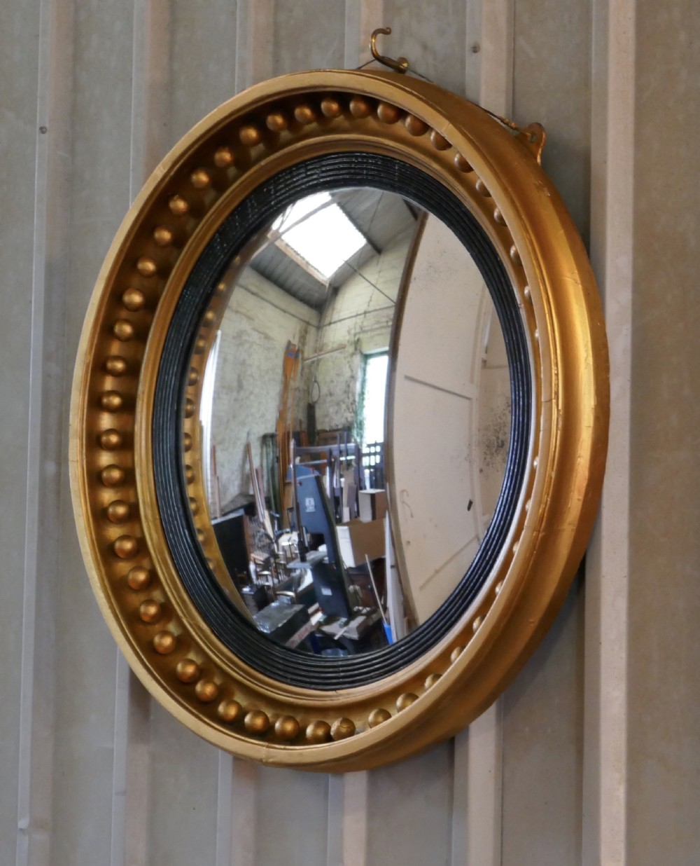 A Large Regency Convex Gilt Wall Mirror  View VIII