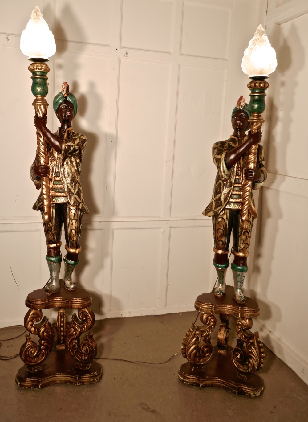 A Magnificent Pair of Venetian Blackamoor Candelabra