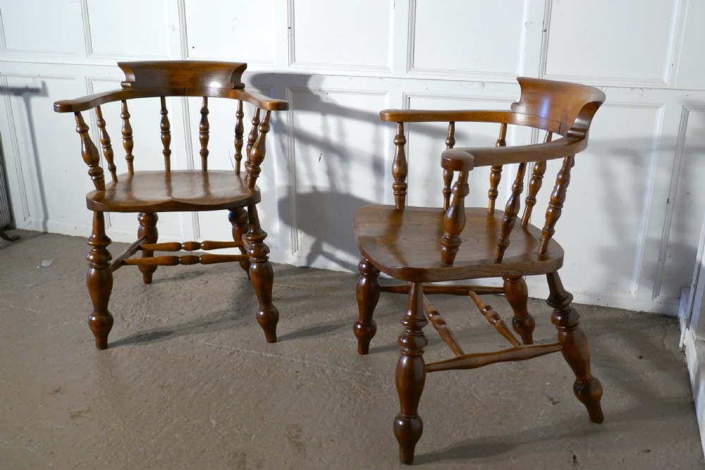 A Pair of Chunky Elm Smokers Bow Office or Desk Chairs