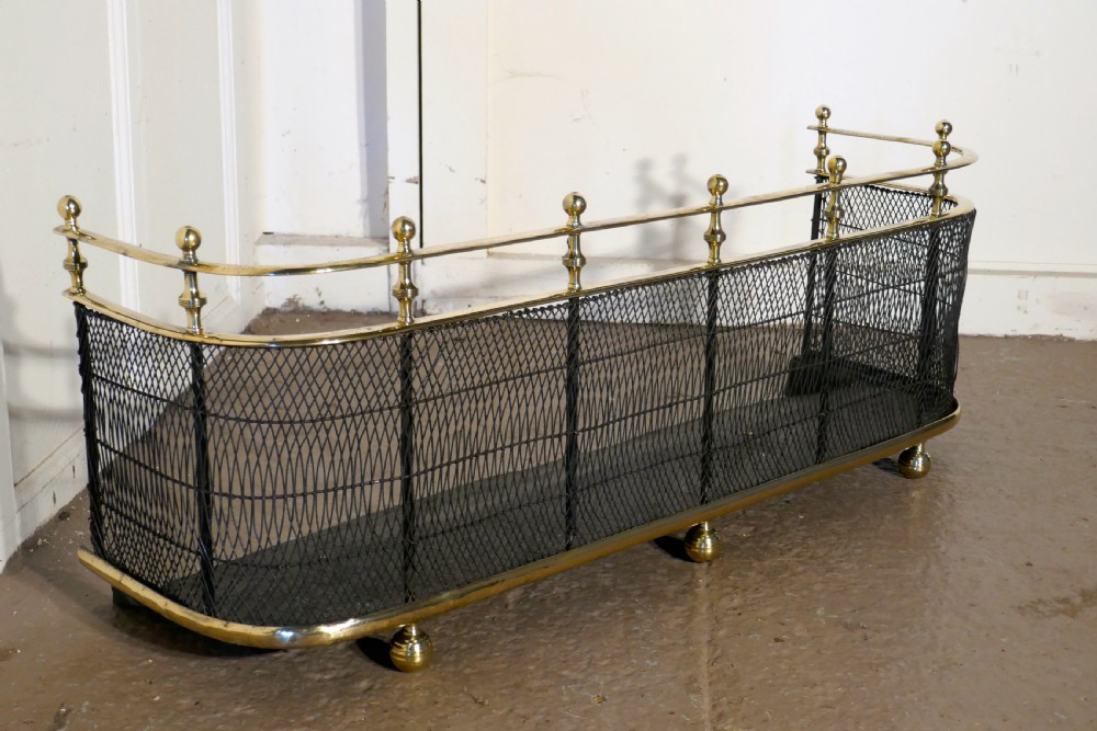 An Early Victorian Brass and Iron Fender or Fireguard View IV