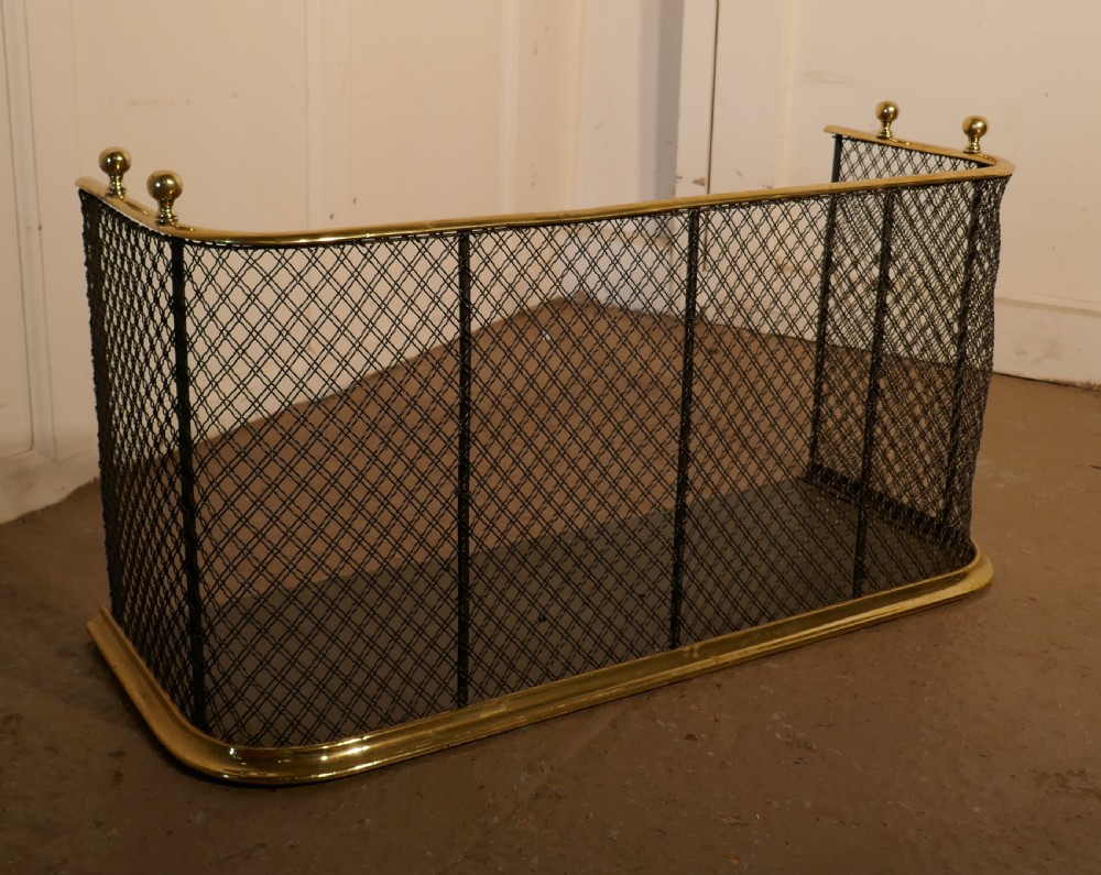 A Victorian Brass and Iron Fender or Fireguard