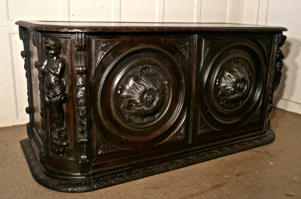 19th Century French One Piece Oak Desk Carved with Cherubs View III