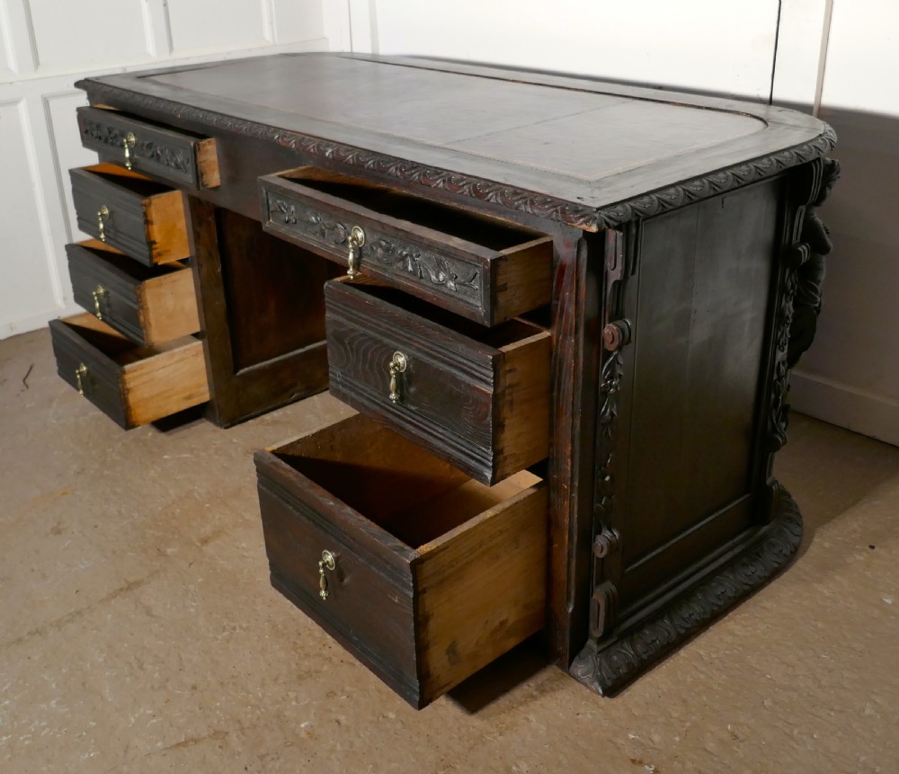 19th Century French One Piece Oak Desk Carved with Cherubs View VI