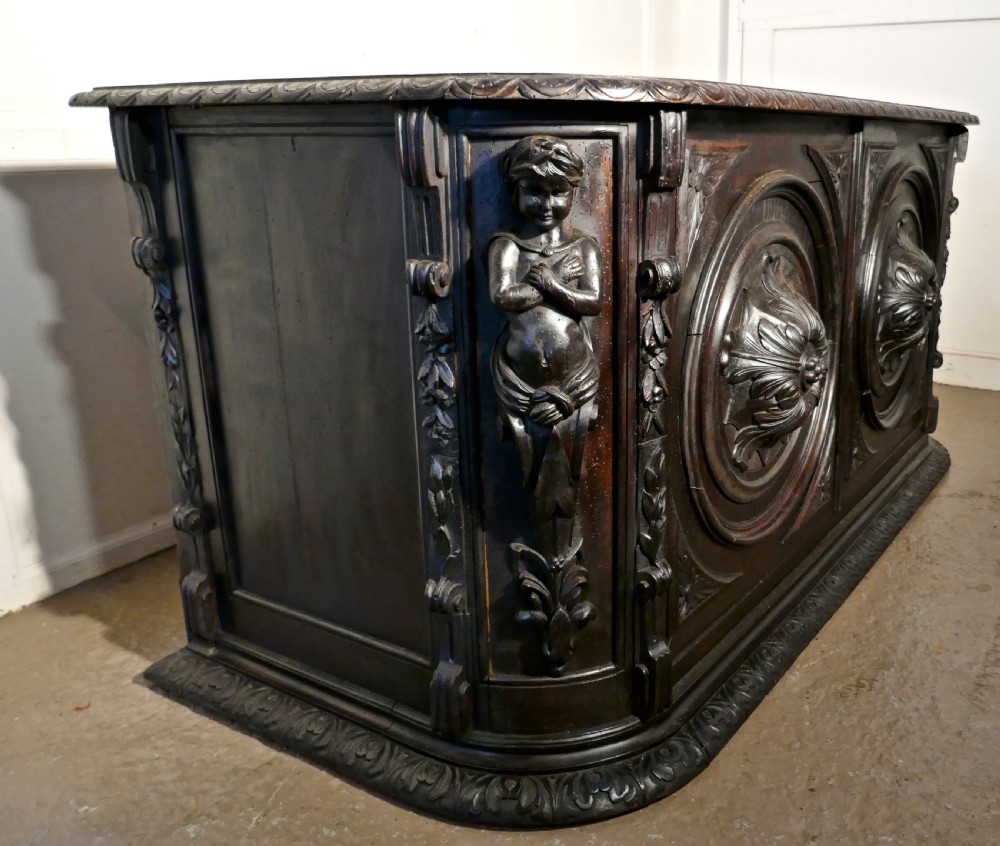 19th Century French One Piece Oak Desk Carved with Cherubs View IX