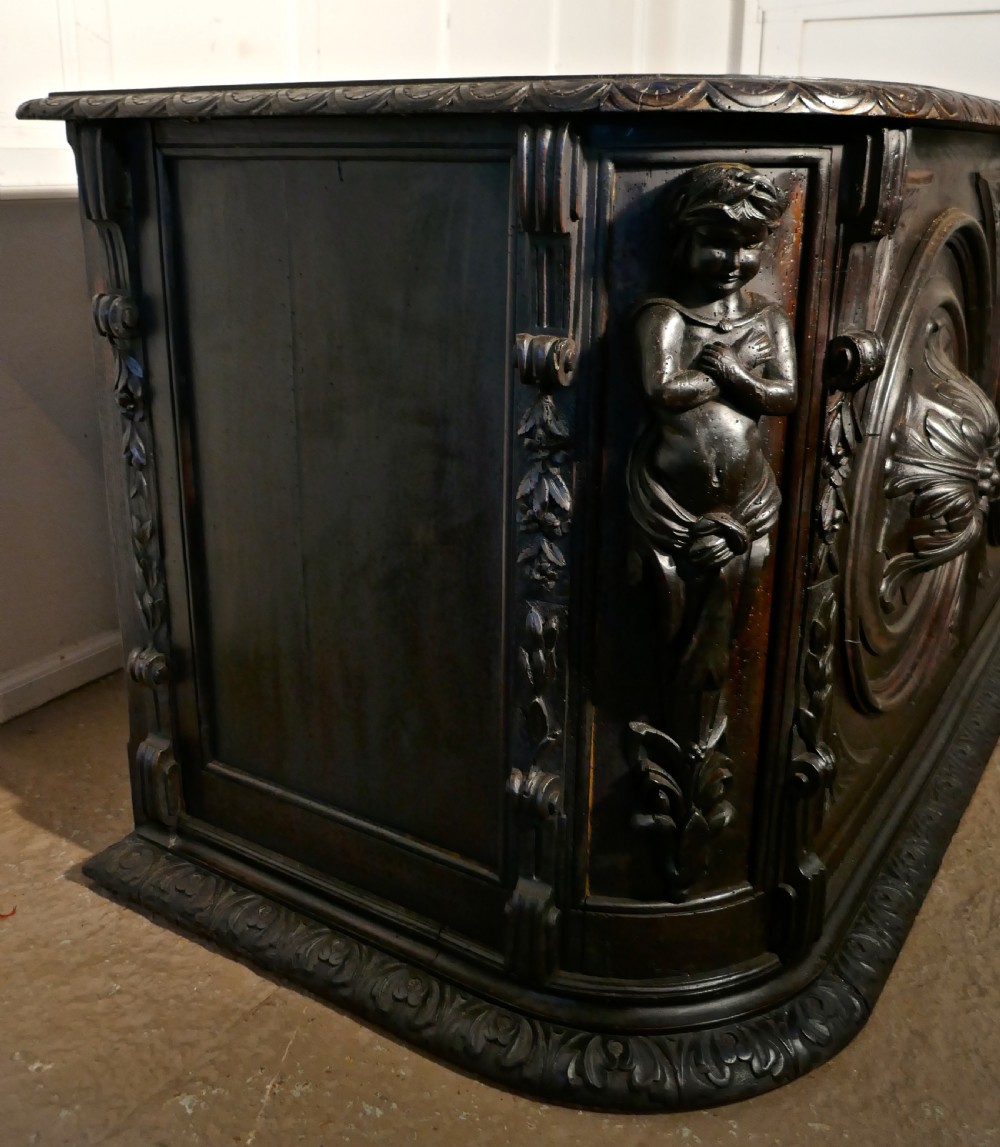 19th Century French One Piece Oak Desk Carved with Cherubs View XI