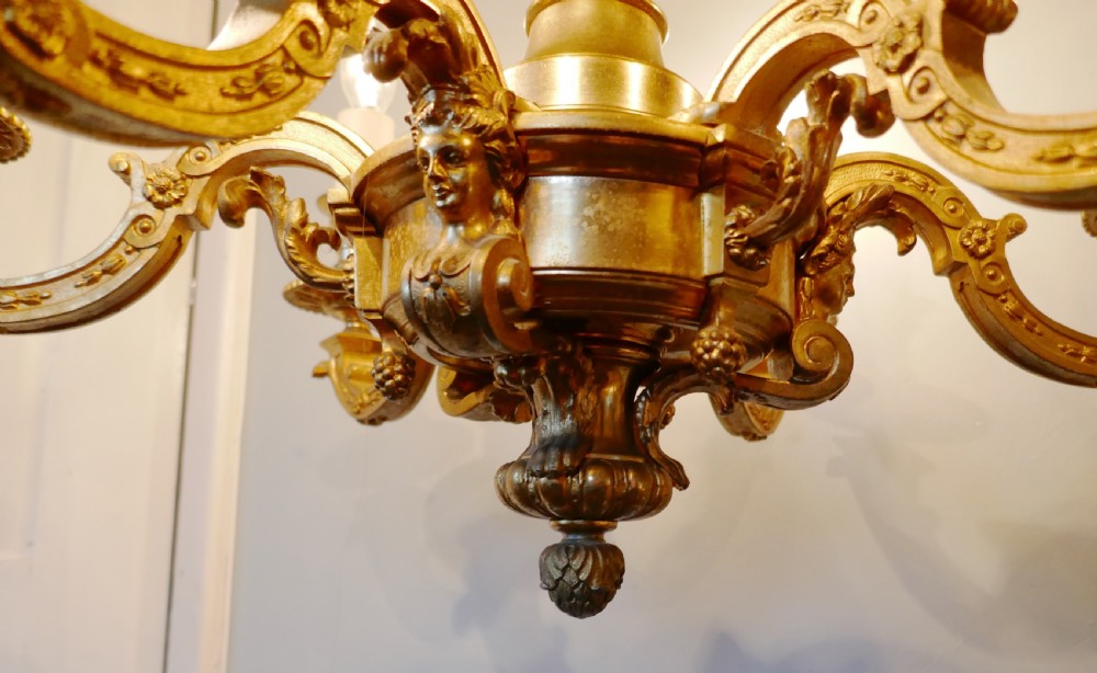 A French Gilded Brass 6 Branch Rococo Chandelier  View XI