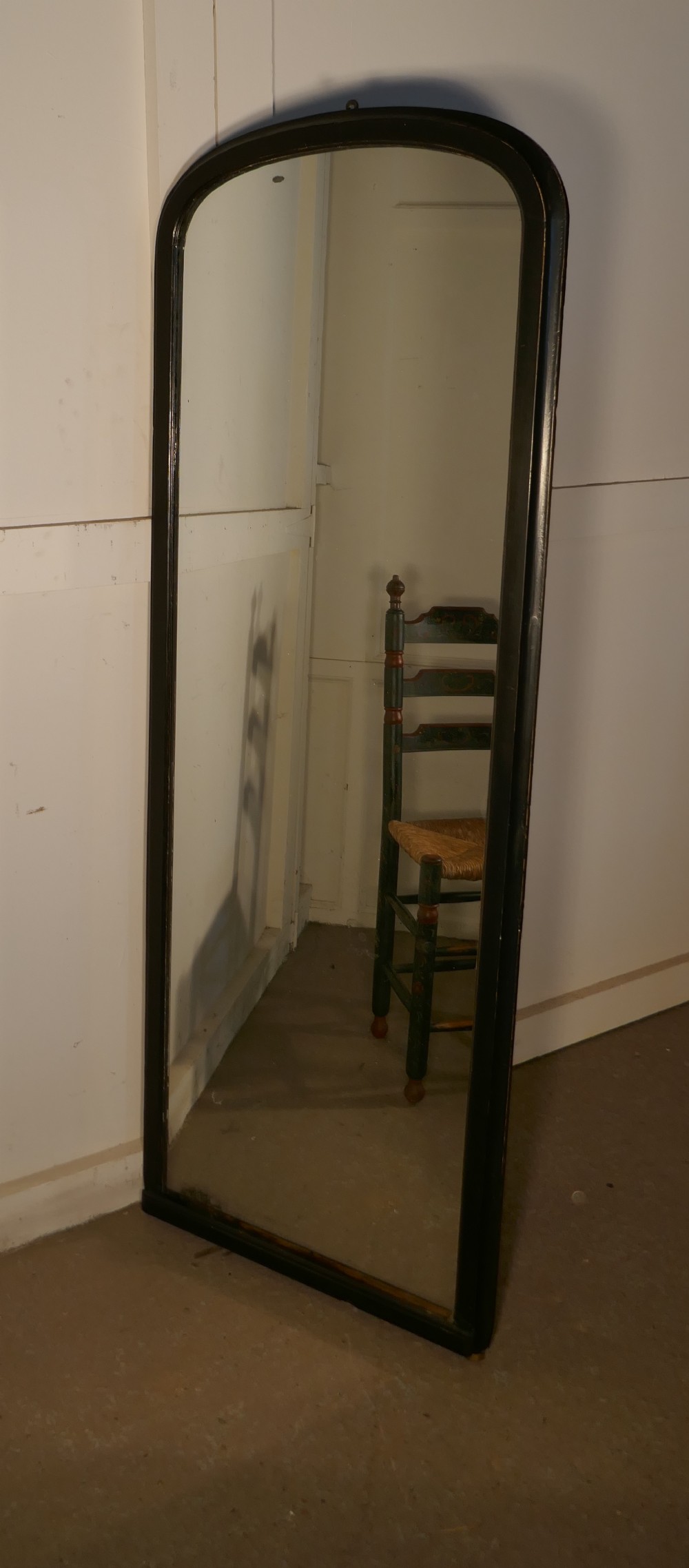 A Tall Console Mirror, with Ebonised Frame