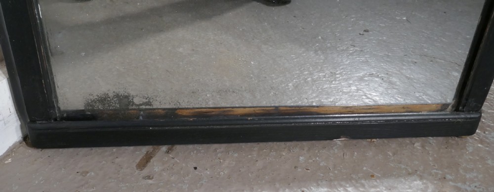 A Tall Console Mirror, with Ebonised Frame View V