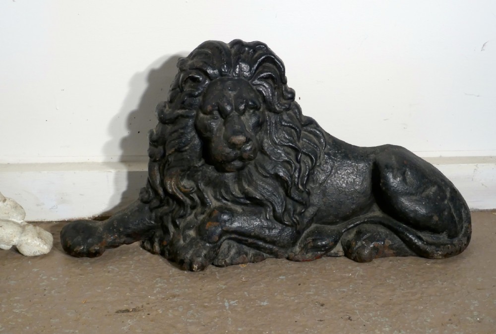 A pair of Flat Back Cast Iron Lion and Unicorn Garden Ornament Figures View V