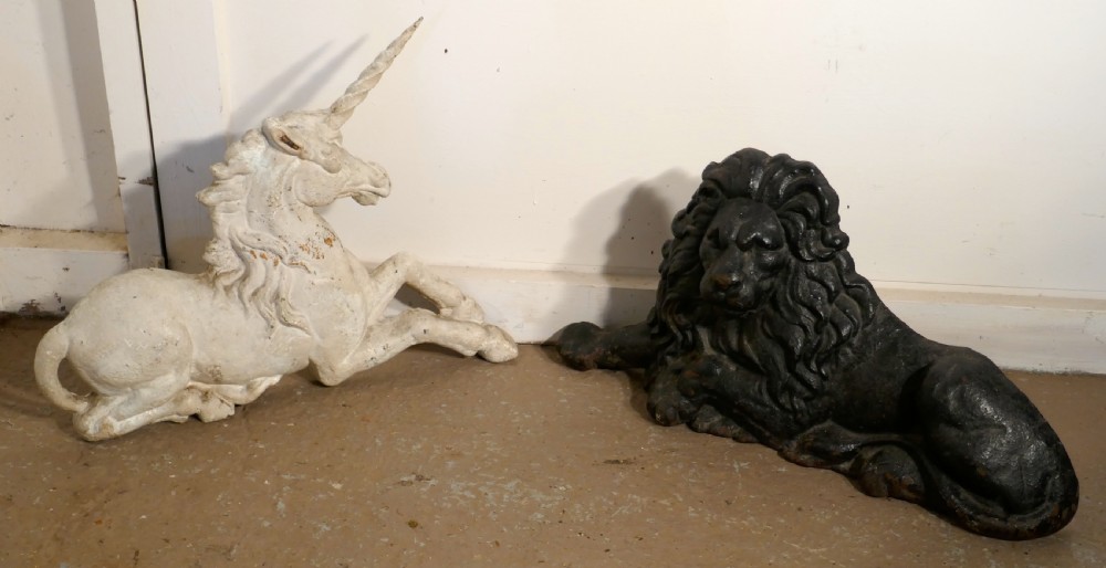 A pair of Flat Back Cast Iron Lion and Unicorn Garden Ornament Figures View VIII