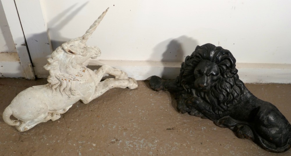 A pair of Flat Back Cast Iron Lion and Unicorn Garden Ornament Figures View IX