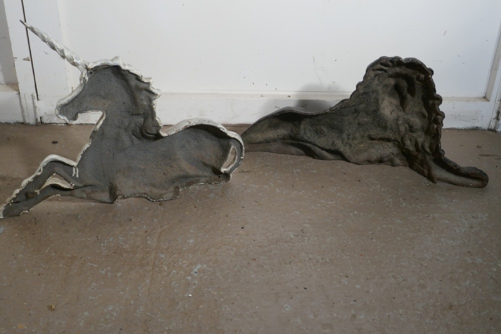 A pair of Flat Back Cast Iron Lion and Unicorn Garden Ornament Figures View X