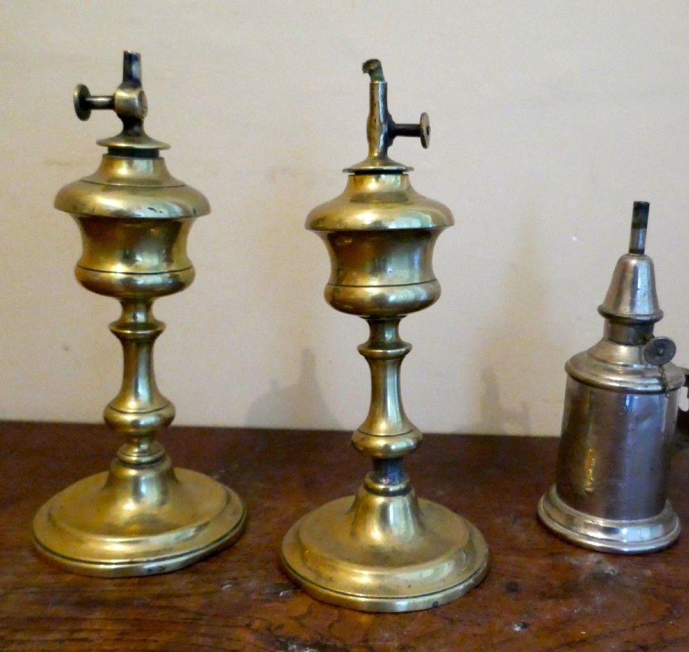 A pair of 19th Century French Brass Pigeon Lamps, and one other