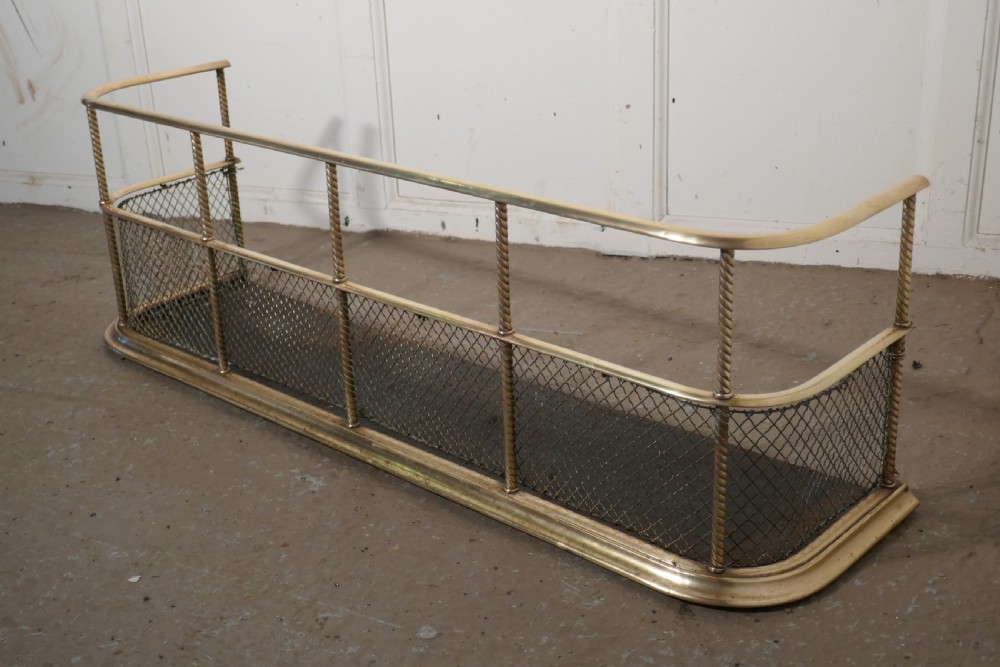 A Victorian Brass Club Fender  View III