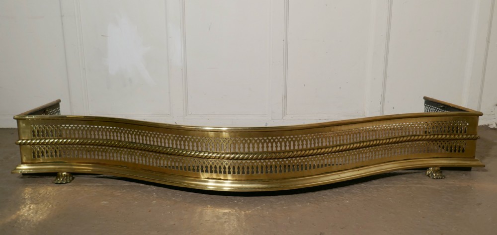 Large Victorian Serpentine Shaped Pierced Brass Fender