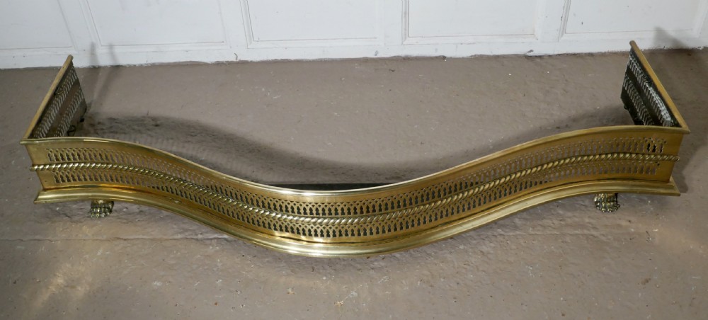 Large Victorian Serpentine Shaped Pierced Brass Fender View II