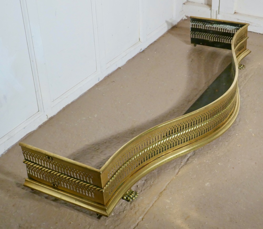 Large Victorian Serpentine Shaped Pierced Brass Fender View VI
