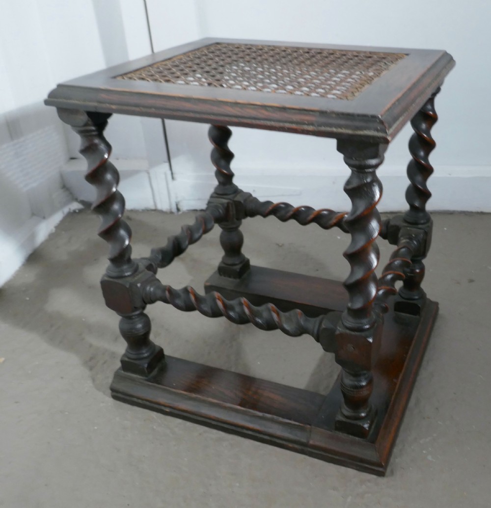 A Pair of Oak Barley-twist and Bergère Fireside Stools View III