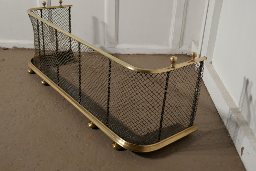 A Victorian Brass and Iron Club Fender View II