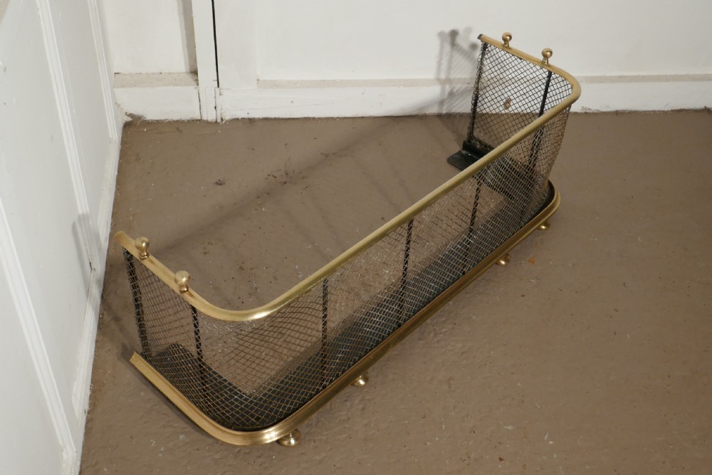 A Victorian Brass and Iron Club Fender View IV