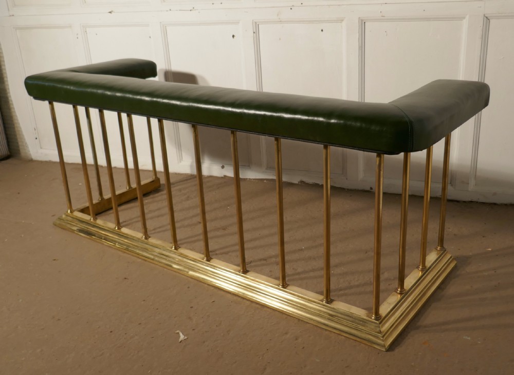 A Large Brass and Green Leather Club Fender View II