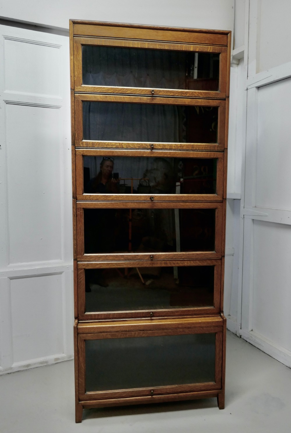 A Tall Art Deco Golden Oak Barrister Waterfall Bookcase, made by Gumm View II
