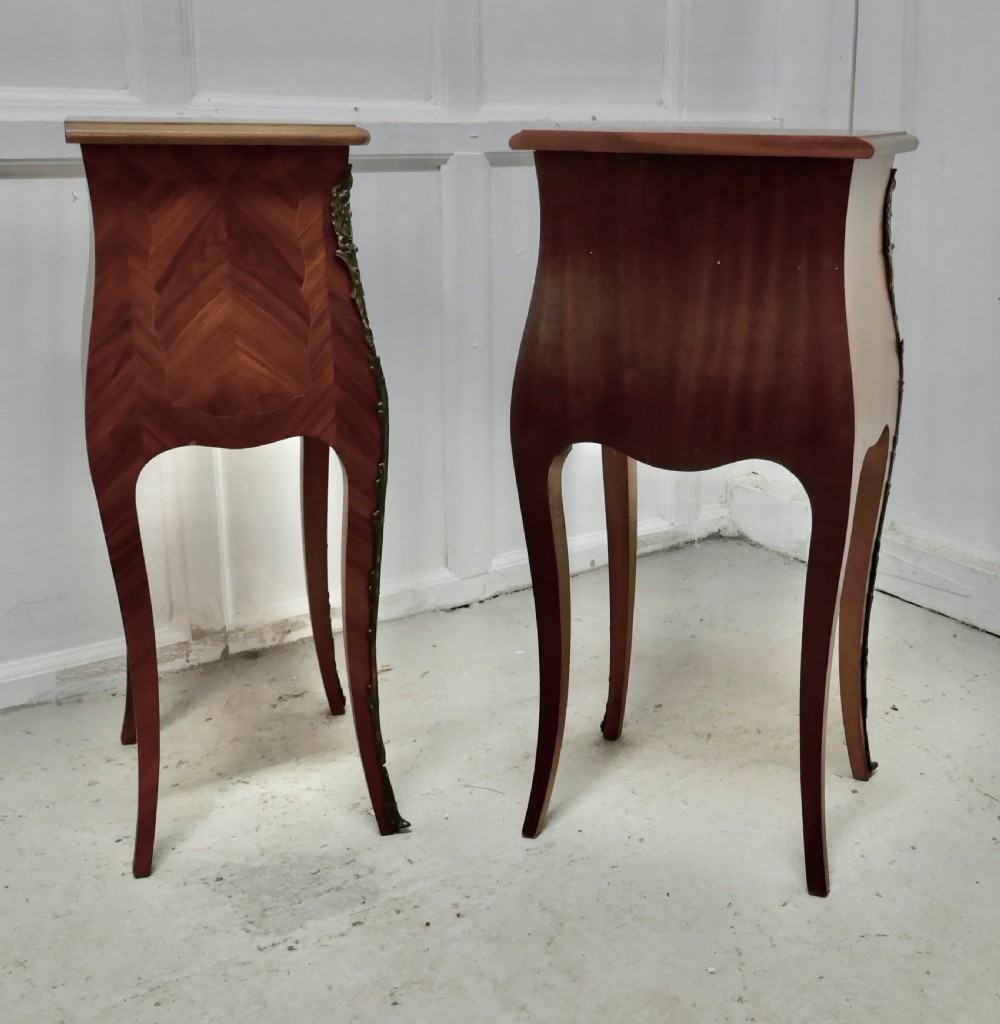 A Pair of Inlaid French Marquetry Bombe Shaped Bedside Cupboards View V