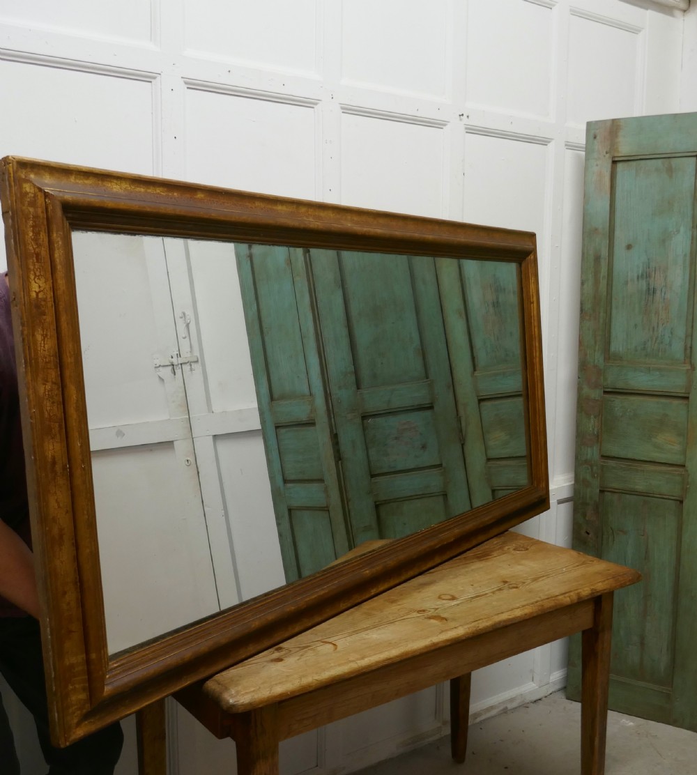 A 19th Century Large French Shabby Gilt Mirror View VIII