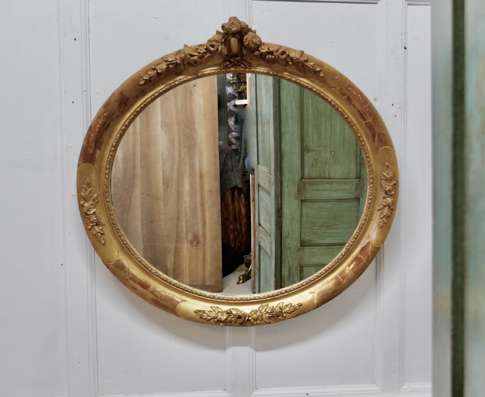 A Large French Rococo Oval Gilt Wall Mirror View IV
