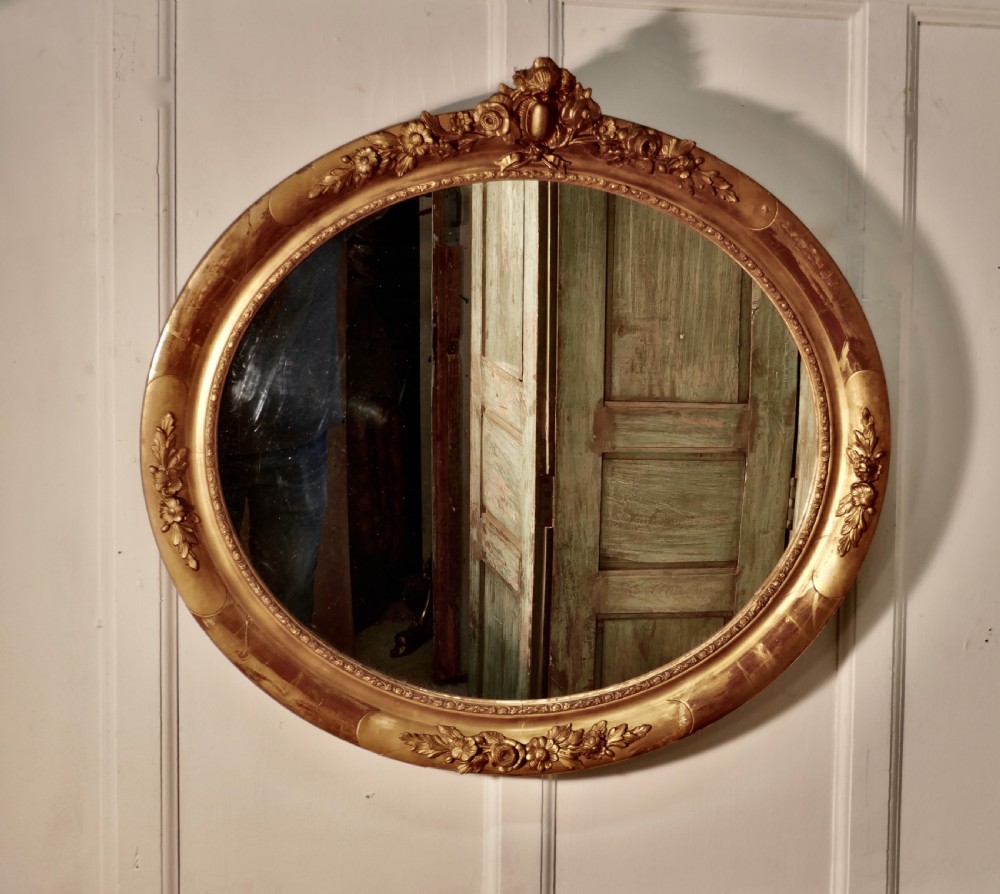 A Large French Rococo Oval Gilt Wall Mirror View V