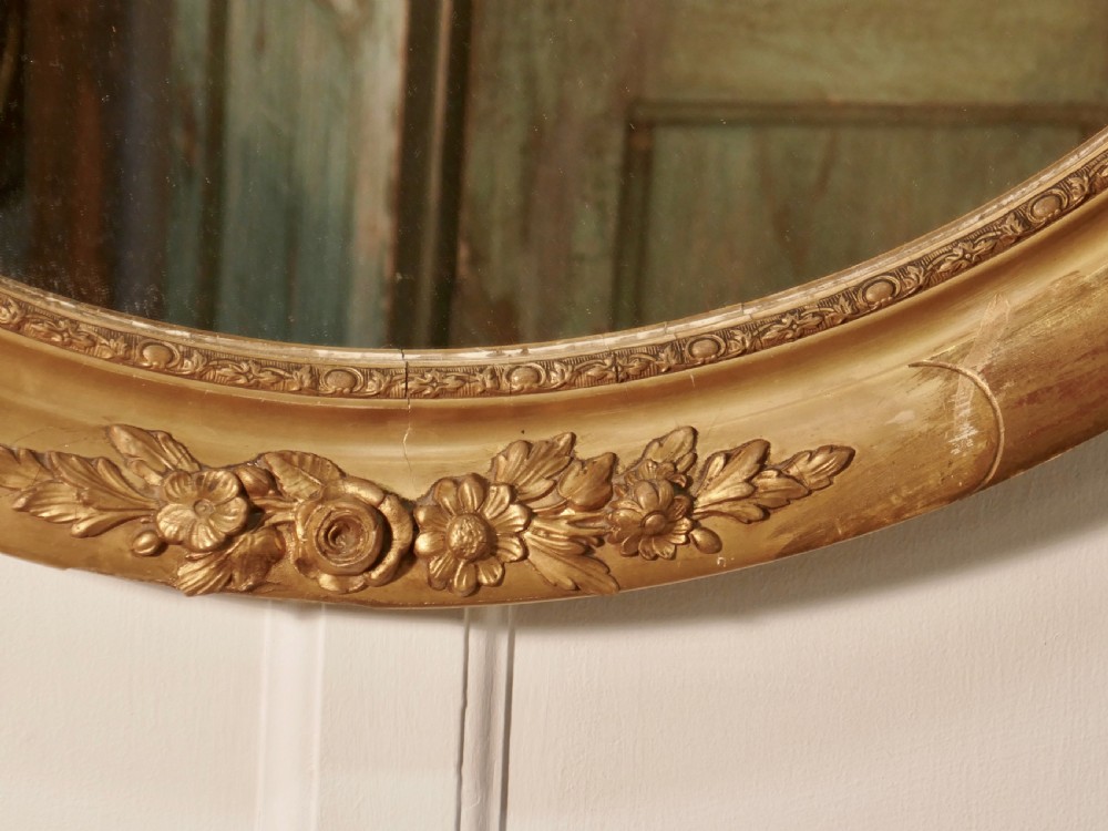 A Large French Rococo Oval Gilt Wall Mirror View VI
